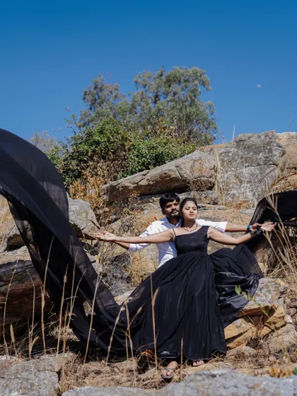 Let’s get that dramatic gown shot. Finding a location with rocky hills allows us to play with flowing fabrics and create truly breathtaking, high fashion portraits.