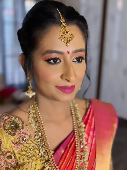 A three-quarter view showing how the makeup enhances her profile, with a focus on glowing cheeks and well-defined eyes.