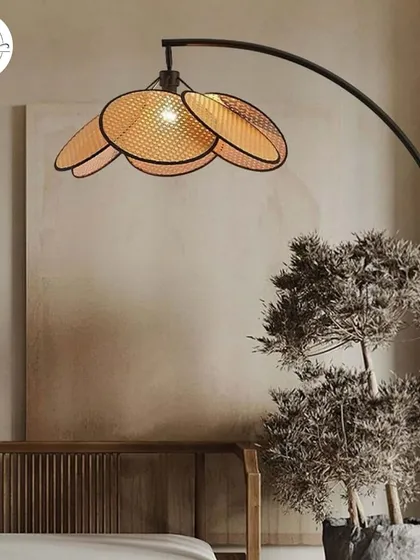 This nature-inspired lamp with a woven, petal-like shade adds an organic and artistic touch to a room.
