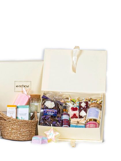 This image shows two of my most popular gifting options: a large, elegant hamper box and a rustic, reusable jute basket. Both can be filled with a custom selection of my handcrafted candles, soaps, and skincare products.