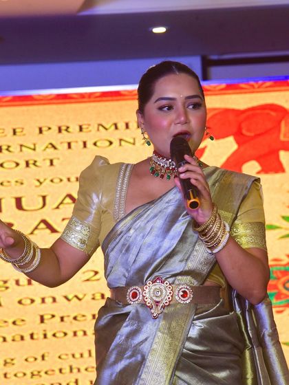 A close-up shot while speaking at the Lemon Tree Hotels awards. I engage directly with the audience, ensuring my words resonate with the spirit of the celebration.