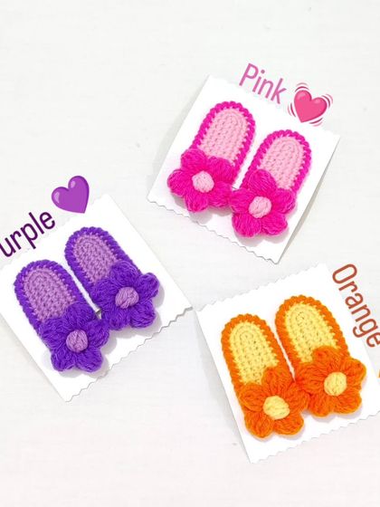 Puff flower hairpin sets in bright pink, purple, and orange combinations.