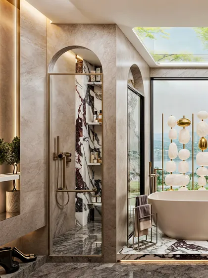 This view emphasizes the freestanding tub set against a large window and a skylight, creating a luxurious, nature-infused bathing experience.