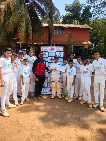The team congratulating Parth Rane for his back-to-back 'Player of the Match' awards in the MI Junior U-14 tournament.