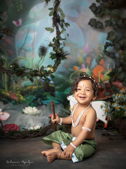 Another angle of our little Krishna in the magical forest, full of smiles and joy.