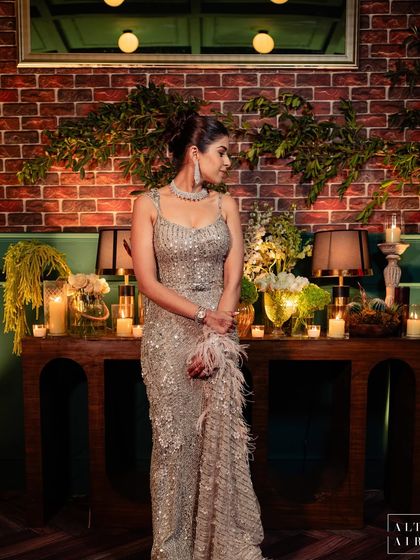 The beautiful bride at her reception. Our goal is to create spaces where our clients not only celebrate but also feel their most glamorous and happy.