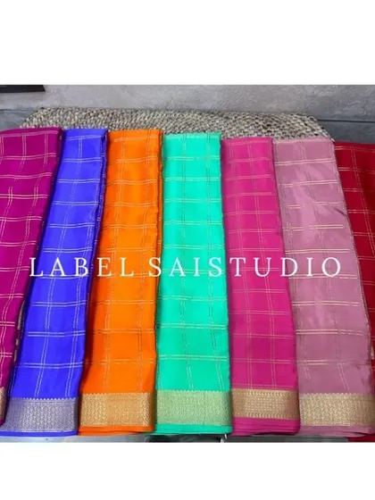 A look at the vibrant colors available in our pure Mysore crepe silk collection. These sarees are perfect for any festival, with traditional check patterns and a thickness of 120 to 140 GSM for a beautiful drape.