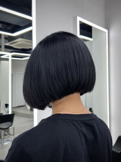 The back of a perfect bob haircut. The clean, sharp line is the hallmark of a great precision cut.