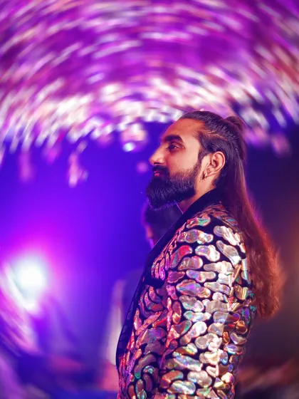 My look is a part of my brand. Whether I'm behind the bar or on the dance floor, I bring a unique style and charismatic presence that adds to the overall vibe of your luxury event.
