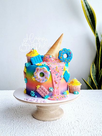 A full view of the confectionery-themed drip cake.