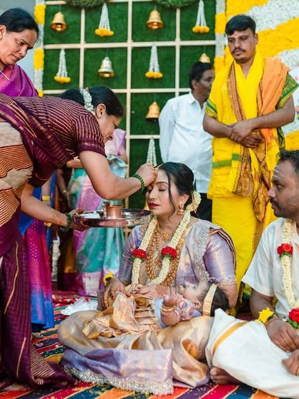 A moment of blessing during a traditional Seemantham ceremony. I focus on capturing the cultural significance and emotional depth of these family events.