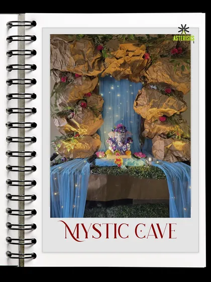 A "Mystic Cave" theme for Ganpati decor. We used craft paper and fairy lights to create an enchanting cave-like setting, adding a touch of magic to the festive occasion.
