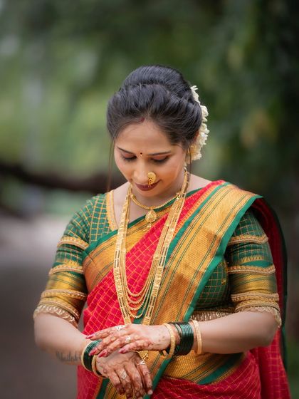 An elegant portrait of a woman dressed in a traditional saree for Vat Purnima. This photo captures a quiet moment of devotion and grace during the festival.