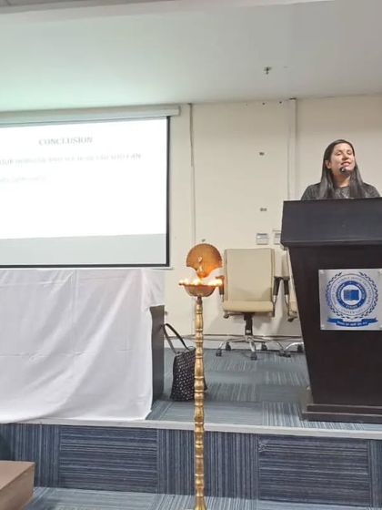 Presenting at a professional event. I am dedicated to continuous learning and contributing to the advancement of the physiotherapy field.