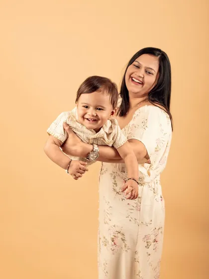 (Hero Item) I love capturing the pure joy between a mother and child. This studio session was all about their natural laughter and connection, creating a timeless memory.