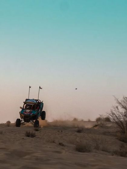 Freezing a moment of peak action. Here you can see my drone capturing a Polaris ATV getting major airtime over a dune.