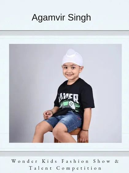 Welcome, Agamvir Singh. His "Gamer" shirt and bright smile show he's ready for fun.