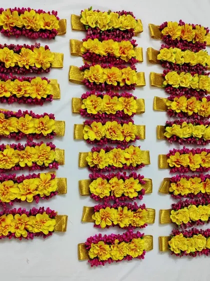 Your bride tribe deserves to feel special too. Here is a set of vibrant yellow and pink floral bracelets I made for a group of bridesmaids. These matching 'Mayoon' bracelets are a beautiful way to bring your whole squad together for the celebrations.