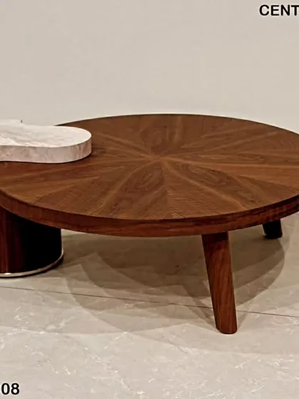 This center table combines a starburst wood veneer top with a modern marble accent piece, creating a sophisticated look.