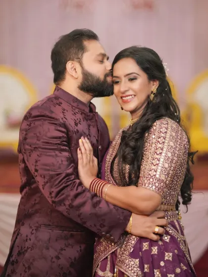A tender, candid moment during an engagement ceremony. We focus on capturing the genuine emotions and quiet interactions that make your celebration unique, preserving the real feelings of the day.