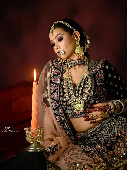 Creating a mood with light and shadow for a bridal portfolio. This shot highlights the intricate details of the lehenga and jewelry, creating a timeless and dramatic portrait.