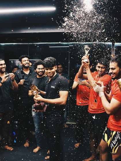 The celebration after a hard-fought victory at our internal club wars. The entire team shares in the success, because we train and win as a family.