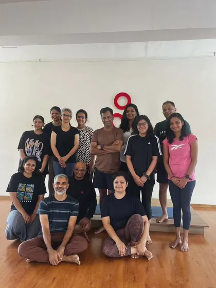 The energy of a group is powerful. This photo was taken after a backbending workshop, capturing the sense of community and shared accomplishment. Whether in a workshop or a regular class, we support and motivate one another on our journeys.