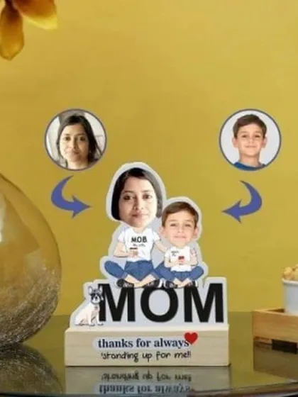 Celebrate your mom with a fun and personal caricature stand. I transform your photos into a unique cartoon representation, complete with a custom message engraved on the wooden base. It's a gift guaranteed to make her smile.