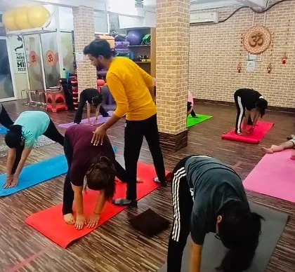 Proper form is everything. Our instructors are always on the floor with you, giving personal attention to make sure you are doing each asana safely and effectively for the best results.