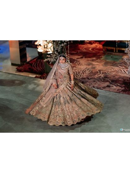 A collection of professional shots of my bride Shachi. Her dusty rose lehenga with a long trail was pure magic. We did a soft glam look with a subtle smokey eye to match the grandeur.
