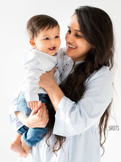A before and after comparison, showing how quickly they grow. This mom and her son, photographed a year apart, is a powerful reminder to capture these moments before they're gone.