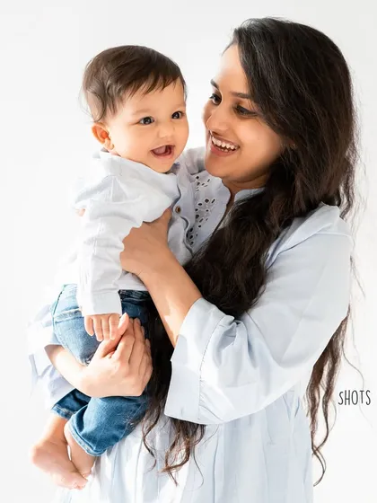 A year apart, and this little boy is about to become a big brother. My Mother's Day sessions are a perfect way to capture your family's journey.