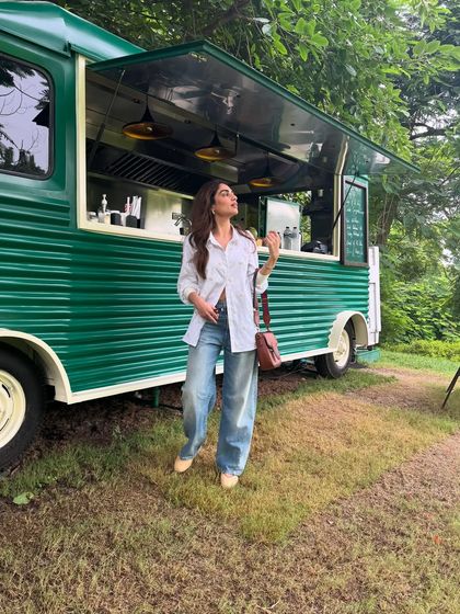 My favorite combination: an oversized white shirt and comfortable baggy jeans. It’s my uniform for a relaxed day of grabbing coffee.