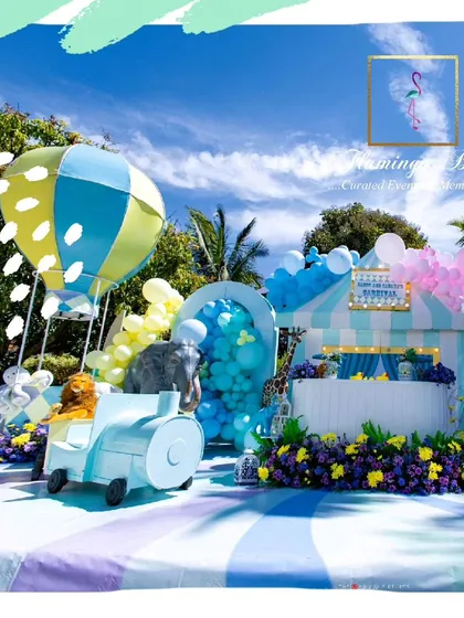 I designed this vibrant pastel carnival for a child's birthday, set against a bright blue sky. The setup features a custom-built carnival stall, a whimsical animal train, and a hot air balloon, creating a large-scale, immersive world for kids to explore.