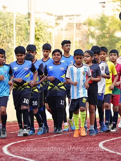 Our older batch of players on a warm-up run, demonstrating leadership and setting an example for the younger groups.