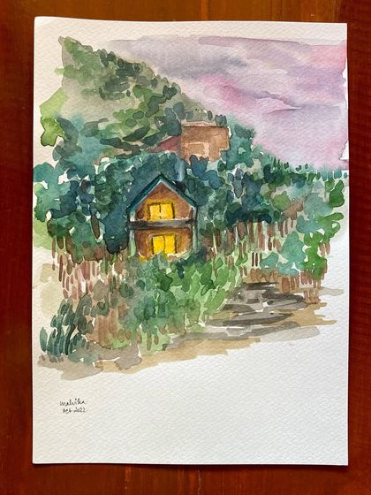 I love how mountain houses seem to glow in the evening. This watercolor painting captures a cozy home tucked away in the trees, with warm light spilling from its windows against a dusky pink sky.