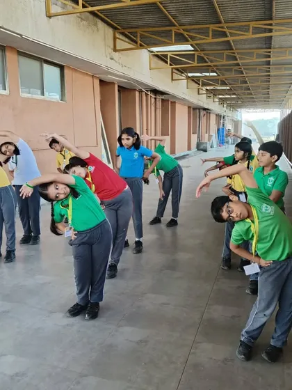 Coordinated group stretching ensures every student is properly warmed up. We guide them through each movement to ensure they perform it safely and effectively.