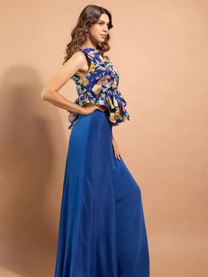 A vibrant look for Riddhi Jain Label. The makeup is kept clean and fresh to balance the bold blue and floral outfit.