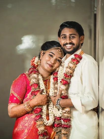 Another beautiful photo of the couple. The bride's traditional attire and makeup make for a timeless wedding portrait.