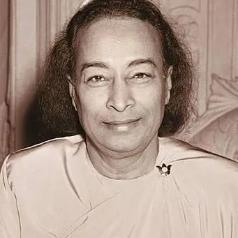 A gentle, smiling portrait of Paramhansa Yogananda. His mission was to spread the science of Kriya Yoga for the self-realization of all humanity.