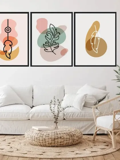 A lovely set of three framed prints combining abstract shapes with delicate leaf line art. The soft, mixed-color palette is versatile and adds a touch of modern, artistic charm to any space.