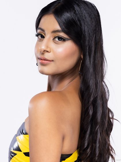 A beauty close-up from the "caution tape" shoot, with a soft, over-the-shoulder look.