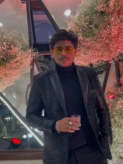A close-up shot in my signature black outfit. For me, black is more than just a color; it's power in fabric, giving me the confidence to connect with any audience.