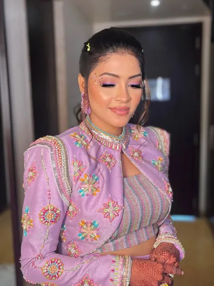 Just a sprinkling of studs to take Krisha’s carnival look to the next level. A fun, creative, and glamorous look for a pre-wedding party.
