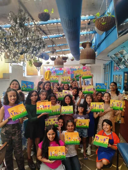 Look at all these proud young artists. This was from Nishka's 10th birthday party, where the kids painted their own floral masterpieces on canvas. My parties for children are all about having fun with colors and taking home a piece of art they created themselves.