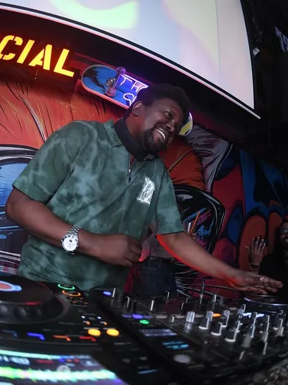Bobkat smiling while he works the mixer. We love what we do.