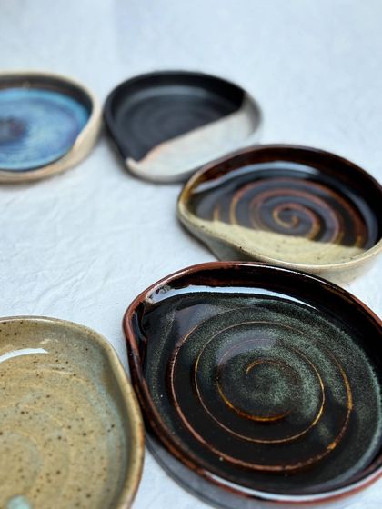 The spiral throwing rings are a prominent feature on our spoon rests, adding texture and a handmade touch.