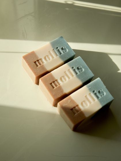 A trio of layered soaps, perfect for gifting or personal indulgence.