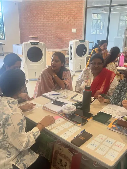 A moment of discovery during a professional development session with teachers. My goal is to create an environment where educators can experience the joy of hands-on learning themselves, so they can bring that same energy and understanding back to their students.