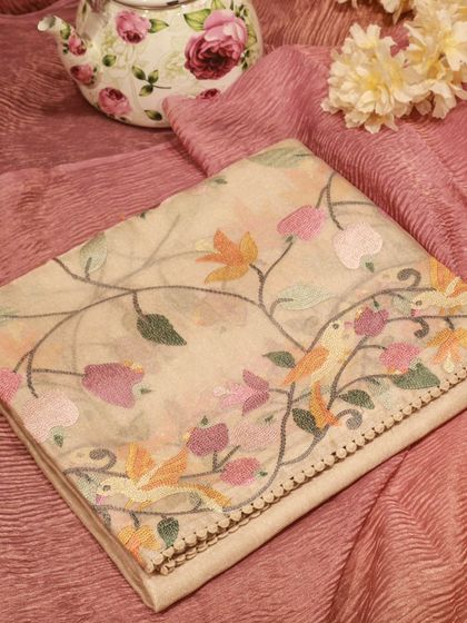 Another color variation of the Paithani embroidered tissue silk saree.